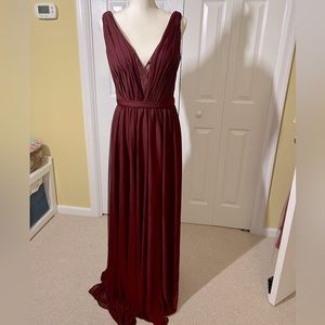 Size 8 Cranberry colored formal gown. New without tags.
